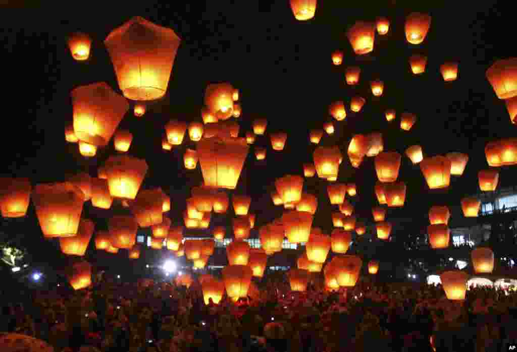 Hundreds of Taiwanese release lanterns in the Pingxi district of New Taipei City, in hopes of good fortune and prosperity in the Chinese New Year before the traditional Lantern Festival. The festival falls on Feb. 14.