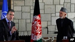 NATO Secretary-General Anders Fogh Rasmussen (l) during a joint press conference with Afghan President Hamid Karzai at the presidential palace in Kabul, March, 4, 2013. 