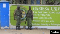 FILE - Kenya Administration policemen stand in front of Garissa University College in Garissa, April 4, 2015. 