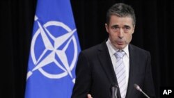 NATO Secretary General Anders Fogh Rasmussen addresses a news conference during a NATO defense ministers meeting at the Alliance headquarters in Brussels, February 3, 2012.