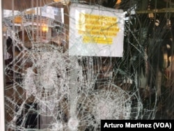 The Hilton Garden Inn is one of the many buildings that suffered broken windows as a result of Wednesday night's violent protests in Charlotte, N.C., Sept. 22, 2016.