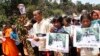 People march to the killing site of Cambodian anti-logging activist Chut Wutty in Koh Kong province, May 11, 2012.