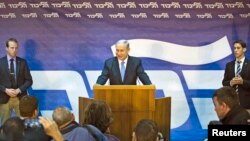 Israel's Prime Minister Benjamin Netanyahu delivers a victory speech in Tel Aviv after winning the Likud party primary, Jan. 1, 2015.