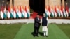 Presiden Prabowo Subianto dan Perdana Menteri India Narendra Modi berjabat tangan menjelang pertemuan mereka di Hyderabad House di New Delhi, India, 25 Januari 2025. (Foto: Altaf Hussain/Reuters)