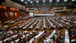 FILE - Lawmakers attend a National Assembly session in Havana, Cuba, July 8, 2016. 