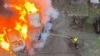 In this photo provided by the Ukrainian Emergency Service, emergency services personnel work to extinguish a fire following a Russian rocket attack in Poltava region Ukraine, Nov. 17, 2024. 