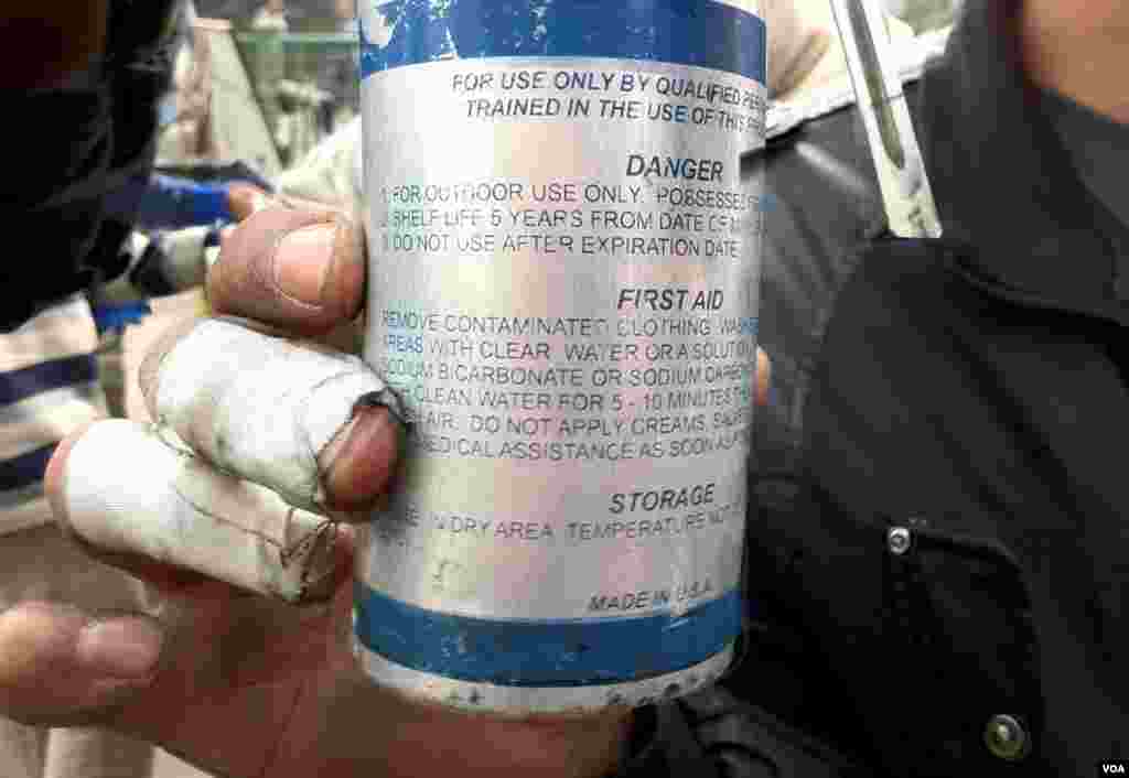 Made in the USA: A tear gas canister is displayed by a protestor on Tahrir square, November 2011. (E. Arrott/VOA)