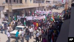 Dîmenek ji xwepêşandana li Helebê. Tebax, 31, 2012. 