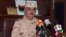 FILE - Eastern Libyan military commander Khalifa Haftar speaks during a news conference in Al Marj, east of Benghazi, Libya, June 4, 2014. 