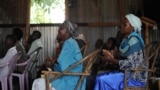 Villagers attend morning church service in the village of Kogelo in Siaya county, Kenya, July 26, 2015. Broadcasting in the Luo language, Dada Radio broadcasts on important issues for women and offers training. 