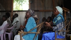 Villagers attend morning church service in the village of Kogelo in Siaya county, Kenya, July 26, 2015. Broadcasting in the Luo language, Dada Radio broadcasts on important issues for women and offers training. 