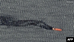 Спутниковое фото грузового судна Rubymar незадолго до затопления, 2 марта 2024 года (фото AFP/Maxar Technologies)