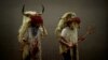 People dressed as Momotxorros, half bull, half man figures dressed in blood soaked sheepskins, take part in carnival celebrations in Alsasua, Spain, February 13, 2018. 