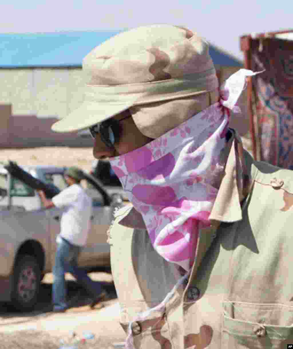 The NTC has yet to issue regular uniforms, Bani Walid, Libya, 11 September 2011. - E. Arrott