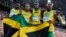 FILE: Men's 4x100m relay Asafa Powell, Usain Bolt, Michael Frater, Nesta Carter of Jamaica celebrate after winning the final of the athletics competition in the National Stadium during the Beijing 2008 Olympic Games, Aug. 22, 2008. 
