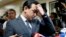 Philippine opposition Sen. Antonio Trillanes gestures as he talks to the media outside his office in the Philippine Senate after posting bail at a regional trial court following an arrest warrant issued, Sept. 25, 2018 in suburban Pasay city, south of Manila.
