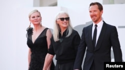 FILE PHOTO- Director Jane Campion with actors Benedict Cumberbatch and Kirsten Dunst at the 78th Venice Film Festival for the film 'The Power of the Dog' in Venice, Italy on September 2, 2021. (REUTERS/Yara Nardi/File)