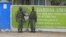 FILE - Kenya Administration policemen stand in front of Garissa University College in Garissa, April 4, 2015. 
