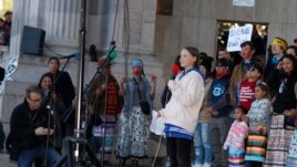 Swedish climate activist Greta Thunberg speaks to several thousand people at a climate strike rally at Denver's Civic Center Park, Friday, Oct. 11, 2019. (AP Photo/David Zalubowski)