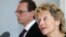 Swiss Finance Minister Eveline Widmer-Schlumpf (R) speaks to media next to European Commissioner for Taxation and Customs Union, Audit and Anti-Fraud Algirdas Semeta during a news conference in Bern, June 17, 2013.