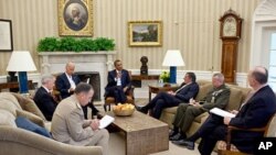 President Barack Obama and Vice President Joe Biden meet with, clockwise from the President, Defense Secretary Leon Panetta, Lieutenant General John Allen, National Security Advisor Tom Donilon, Chairman of the Joint Chiefs of Staff Admiral Mike Mullen, a