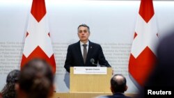 Swiss President Cassis addresses a news conference in Bern