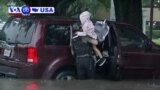 VOA60 America - Tropical Storm Imelda continued to dump torrential rains on southeastern Texas Friday