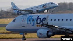 A Flybe plane takes off from Manchester Airport in Manchester, Britain, Jan. 20, 2020. 