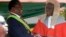 FILE: Zimbabwean President Emmerson Mnangagwa,left, is congratulated by Chief Justice Luke Malaba after taking his oath during his inauguration ceremony at the National Sports Stadium in Harare, Sunday, Aug. 26, 2018. (AP Photo/Tsvangirayi Mukwazhi)