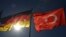 FILE - Turkish and German flags flutter before the visit of Turkish President Recep Tayyip Erdogan, at the airport in Berlin, Germany, Sept. 27, 2018.
