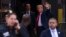 Former President Donald Trump waves to supporters upon arriving at Trump Tower, Monday, April 3, 2023, in New York. 