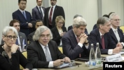 FILE - U.S. Energy Secretary Ernest Moniz (2nd from Left) participates in Iran nuclear negotiations in Lausanne, Switzerland.