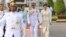 Thailand's King Maha Vajiralongkorn, center, Queen Suthida, right, and his daughter Princess Bajrakitiyabhaarrive, third right, arrive at Royal Plaza to pay homage to the Equestrian Statue of King Chulalongkorn in Bangkok, May 2, 2019. 