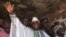 Sierra Leone's incumbent President Ernest Bai Koroma waves to supporters after voting in the capital, Freetown, November 17, 2012.