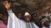 Sierra Leone's president Ernest Bai Koroma waves to supporters after voting in the capital, Freetown, November 17, 2012.