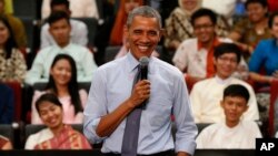 U.S. President Barack Obama smiles as he takes questions from the floor at the Young Southeast Asian Leaders Initiative (YSEALI) town hall meeting at Taylor's University in Kuala Lumpur, Malaysia, Nov. 20, 2015.