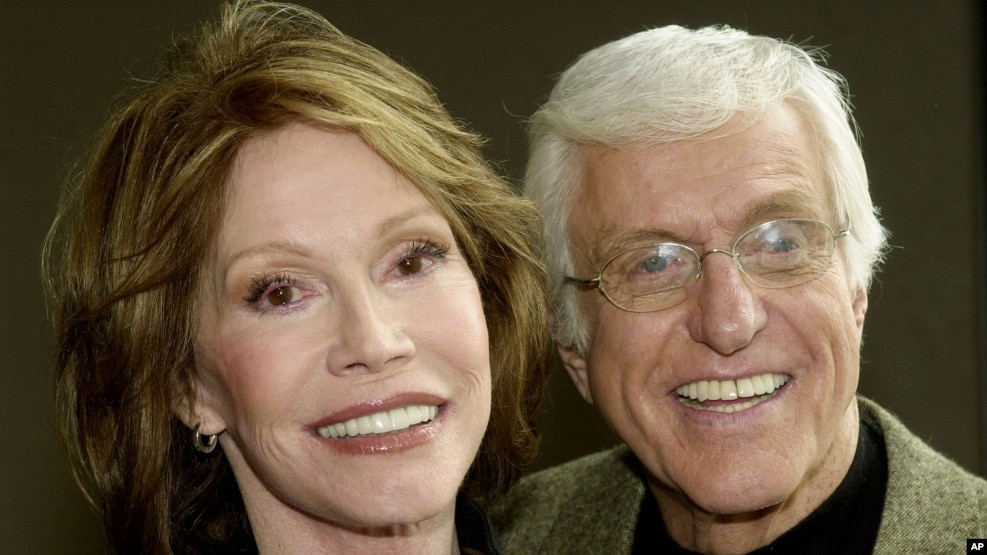 FILE - Mary Tyler Moore and Dick Van Dyke pose together following a press conference announcing their reunion in a new television adaptation of the play, "The Gin Game," part of the drama series "PBS Hollywod Presents," in Los Angeles' Hollywood district,