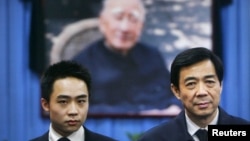 Bo Xilai, right and his son, Bo Guagua (2007 file photo)