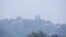 A thick layer of smog covers Wat Phra That Doi Suthep in Chiang Mai province, Thailand, Tuesday, April 2, 2019. (AP Photo/Maytanan Merchant)