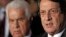 FILE - Cyprus' president Nicos Anastasiades (r) and Turkish Cypriot leader Dervis Eroglu, talk to the media after their meeting in the divided capital Nicosia.