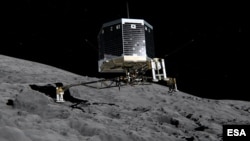 FILE - Still image from animation of Philae separating from Rosetta and descending to the surface of comet 67P/Churyumov-Gerasimenko, Nov. 2014.