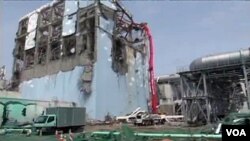 Salah satu gedung reaktor di PLTN Fukushima yang rusak.