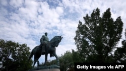 A statue of Confederate Gen. Robert E. Lee is shown in Market Street Park July 9, 2021, in Charlottesville, Virginia.