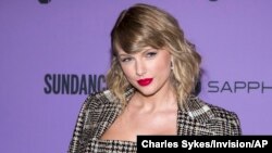FILE - Taylor Swift attends the premiere of "Taylor Swift: Miss Americana" at the Eccles Theater during the 2020 Sundance Film Festival on Thursday, Jan. 23, 2020, in Park City, Utah. 