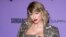 FILE - Taylor Swift attends the premiere of "Taylor Swift: Miss Americana" at the Eccles Theater during the 2020 Sundance Film Festival on Thursday, Jan. 23, 2020, in Park City, Utah. 