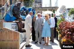 Britain's Prince Charles and Camilla, Duchess of Cornwall visit the Muraleando Community Centre in Havana, Cuba, March 25, 2019.