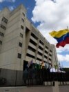 FILE - A Venezuelan flag flies outside the Supreme Court in Caracas, Venezuela, Jan. 22, 2021.