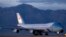 U.S. President Barack Obama arrives on Air Force One at Hill Air Force Base in Utah on April 2, 2015, to announce support for military veterans.