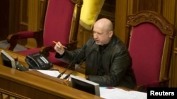 Newly-elected speaker of parliament Oleksander Turchynov, who on Sunday assumed interim presidential powers, is seen in the parliament building in Kyiv February 22, 2014.