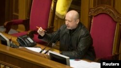 Newly-elected speaker of parliament Oleksandr Turchynov, who on Sunday assumed interim presidential powers, is seen in the parliament building in Kyiv February 22, 2014.